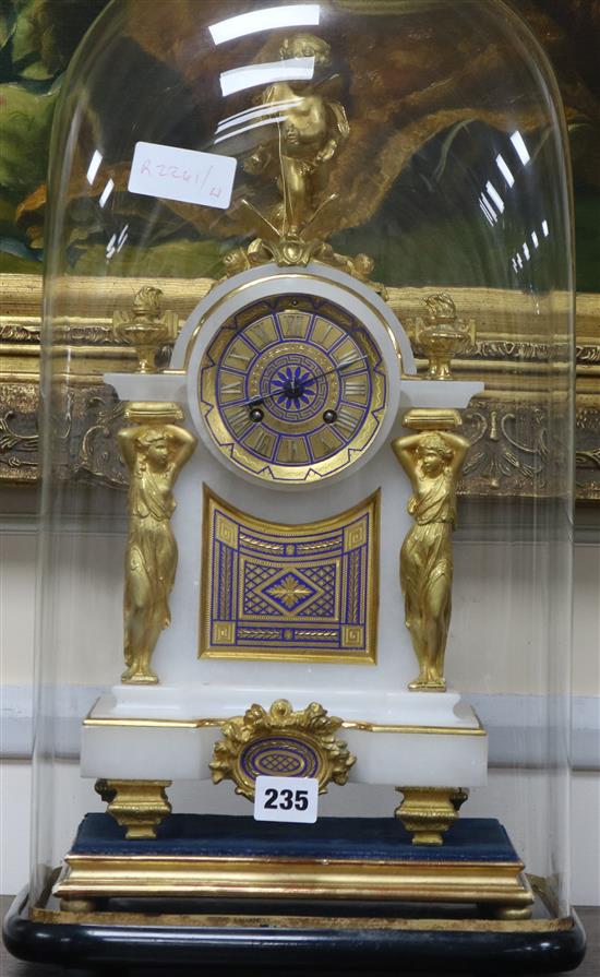 White and gilt marble clock under dome